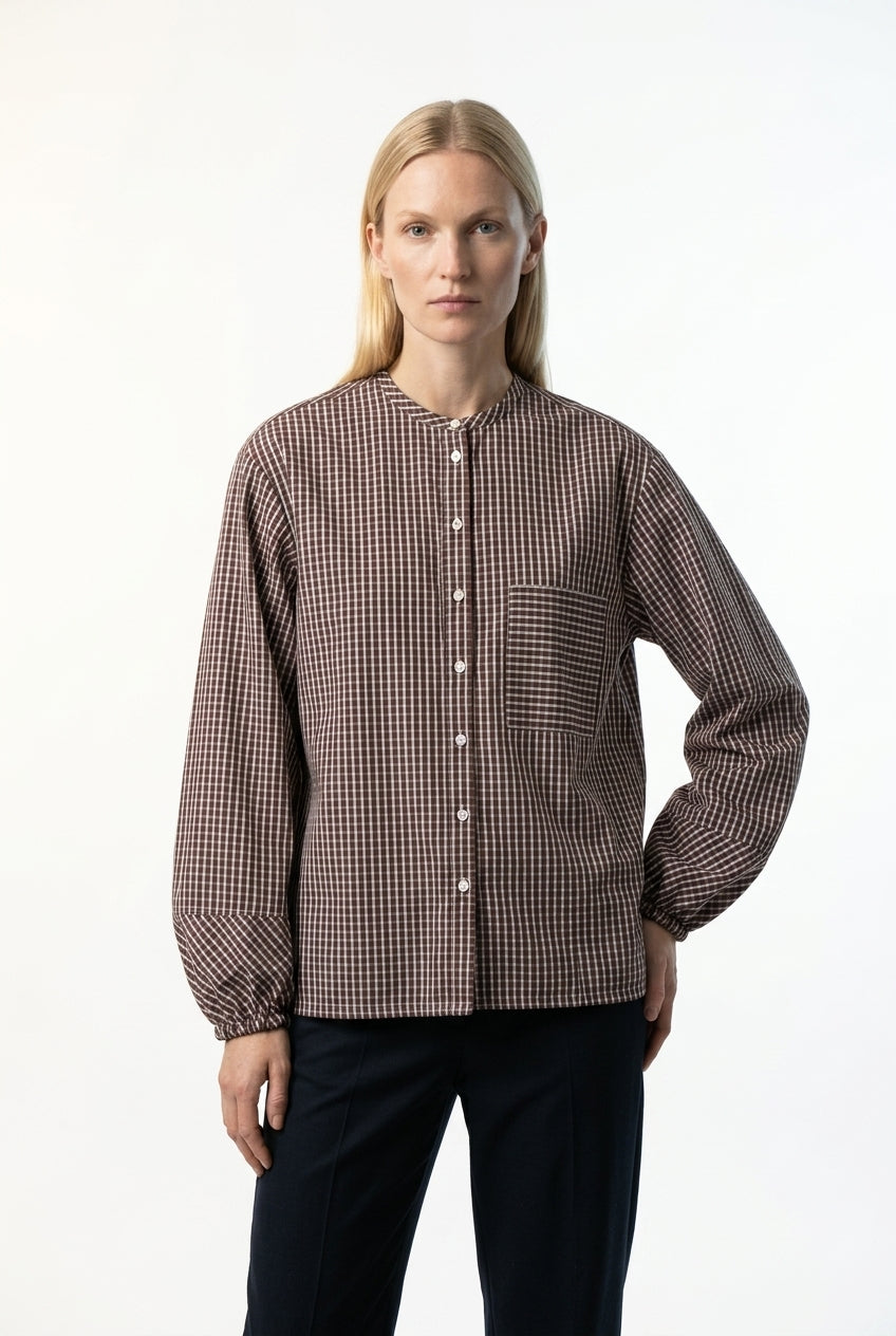 Women wearing a brown checked shirt in cotton