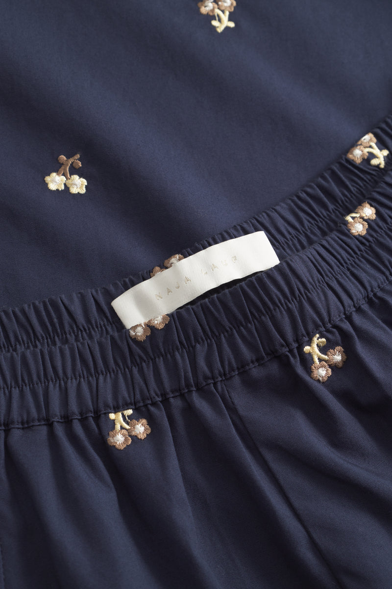 Naja Lauf CIRA SKIRT EMBROIDERED FLOWER SKIRTS NAVY